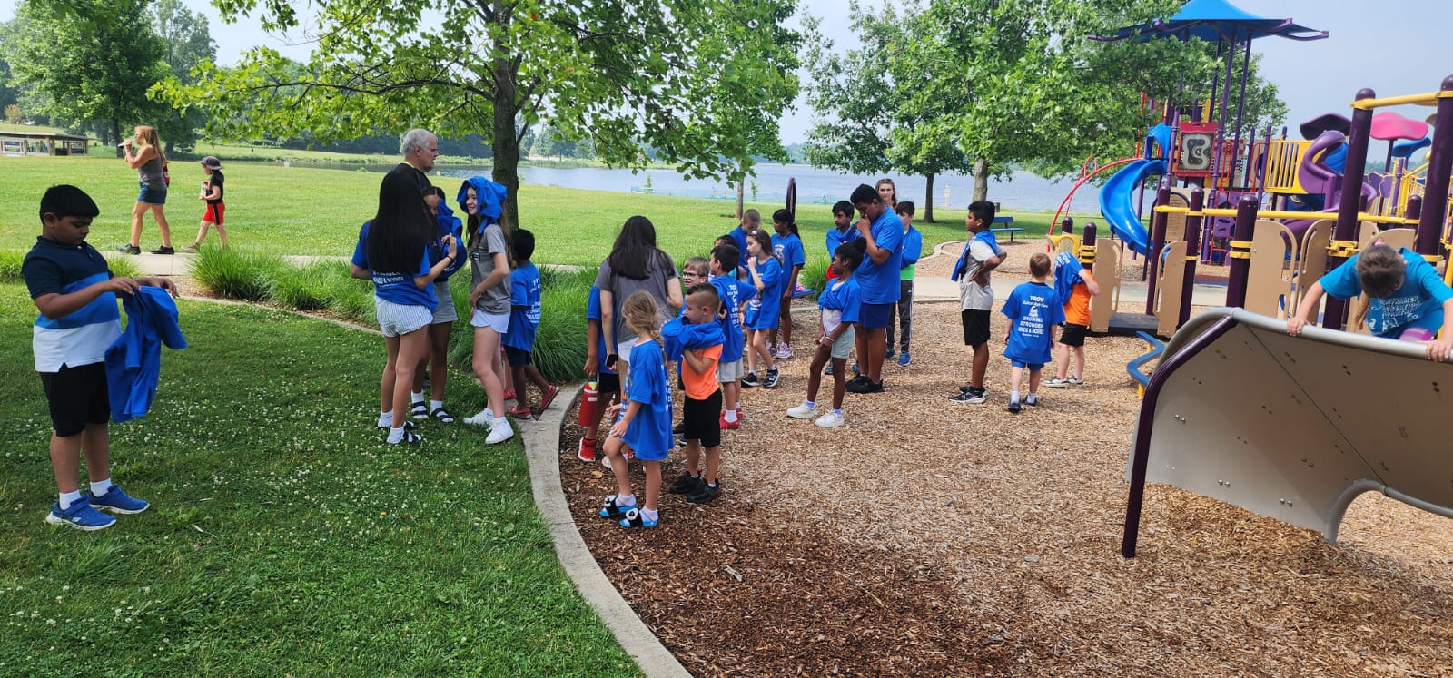Summer camp kids on a field trip to the park